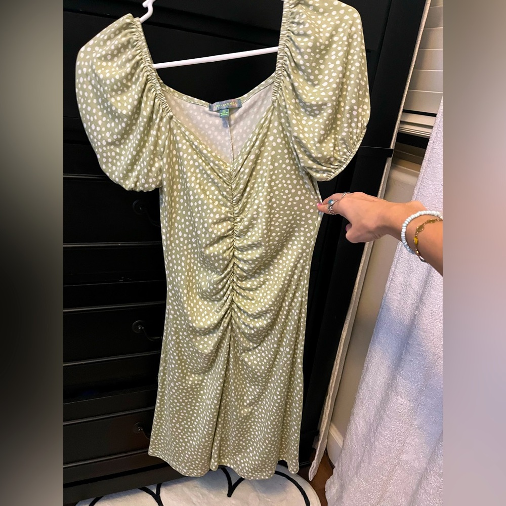 Green polka-dot dress
